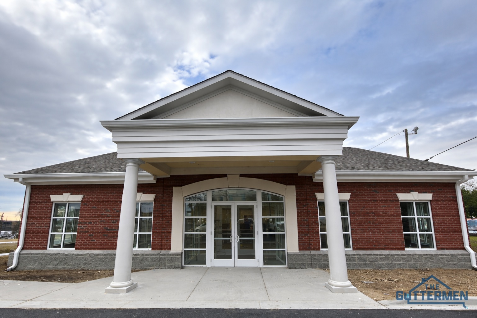 Commercial seamless gutter installation